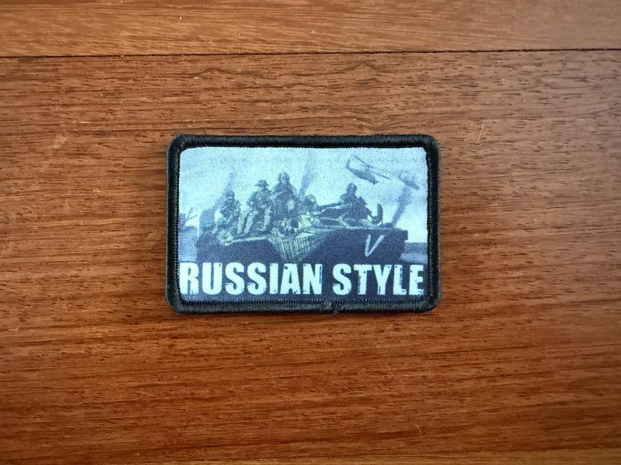 The Russian Style Tank & Soldiers Design Patch by Tanki Store features soldiers on a military vehicle with bold white text—ideal for collectors seeking quality military badges in bulk at the best price.