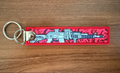 Double-Sided Keychain with Rifle and Roses Design by Korps Vyshivaniya