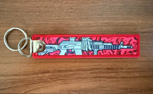 Double-Sided Keychain with Rifle and Roses Design by Korps Vyshivaniya