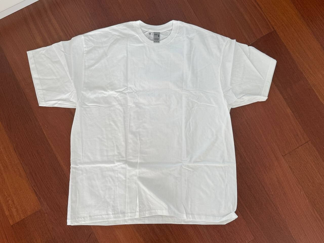 White T-shirt with Rifle Girl Back Print Sizes: L by Korps Vyshivaniya