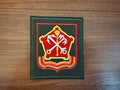 Russian Western Military District Official VKBO Military Patch featuring a pentagon emblem with crossed white anchor, key, and anchor symbols outlined in red and yellow on a dark green background.