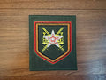 Russian 1430th Guards Motorized Rifle Regiment Official VKBO Military Patch featuring a star emblem with crossed swords and layered orange and red borders on a green fabric background.