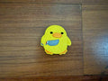 Russian Tactical Duck - Military Patch featuring a bright yellow duck holding a blue tactical knife, embroidered on fabric with detailed stitching.