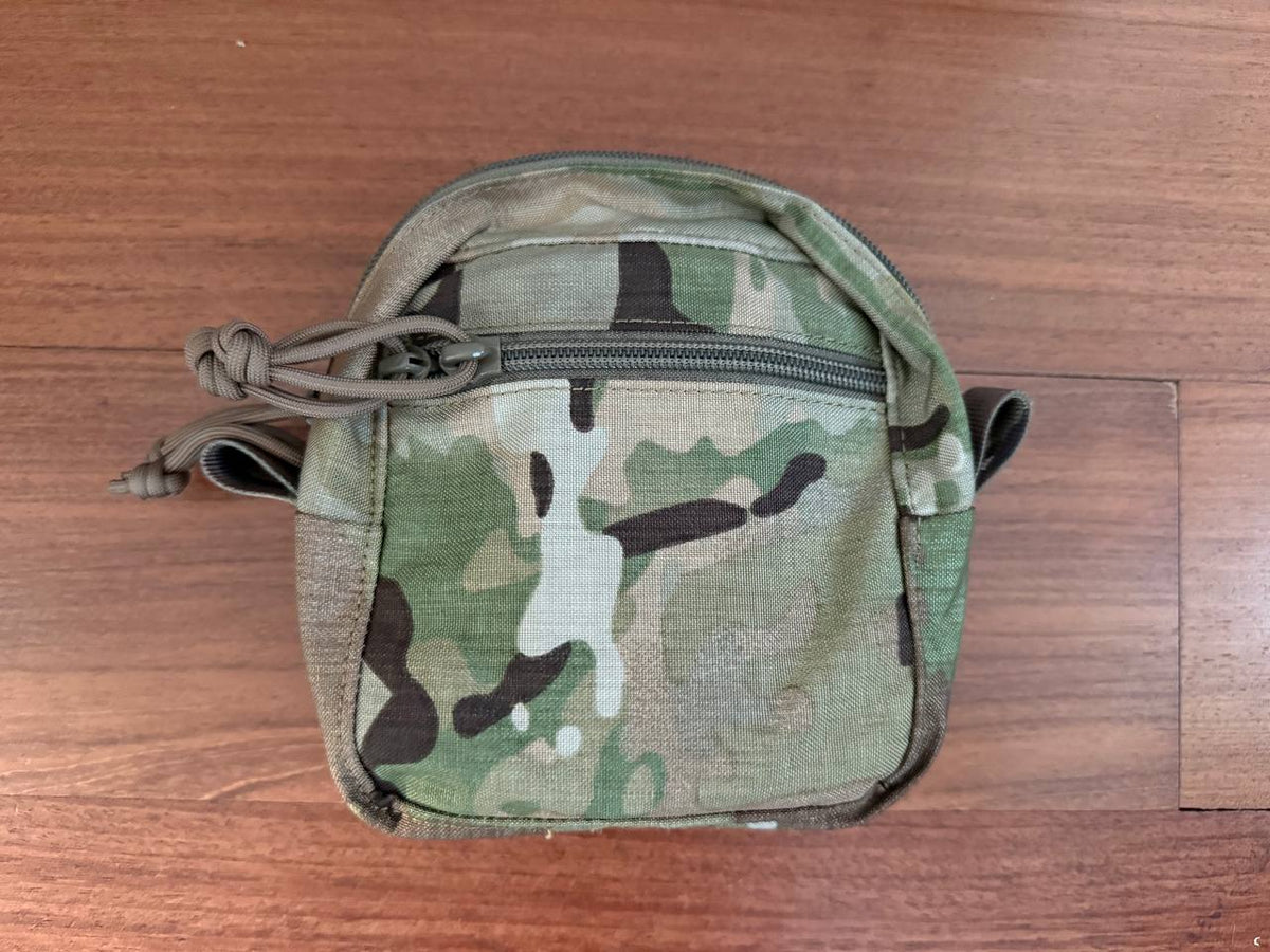 Tactical Vertical Utility Pouch - Multicam - USED, compact camouflage gear pouch with zipper closure and durable fabric, suitable for tactical or outdoor use.