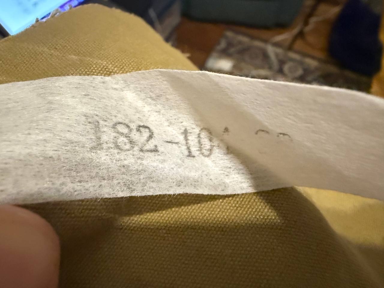 Close-up of the size label reading 182-104-88 on the fabric of a Russian ANA Gorka 1 Military Suit - Size 182-104-88, showcasing details of this Russian surplus military gear.