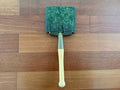 Russian Military Shovel & Tekhinkom Shovel Pouch Set with a wooden handle shovel featuring a green camouflage pouch, displayed on a hardwood floor, highlighting Russian surplus gear.