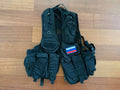 Russian ANA - "Gorod-2" Tactical Vest – Black laid flat on a wooden floor, showing multiple utility pockets and a patch with the Russian flag, designed for tactical use.