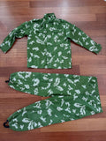 Russian AO NPP Klass White Breaks Suit - Size 48-50/3-4 displayed flat on a wooden floor, featuring a green fabric with white camouflage pattern, standard collar jacket and matching pants with elastic cuffs.