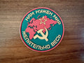 Russian "We need peace, preferably all of it" - Military Patch featuring a red map of the world with a Soviet star and hammer and sickle symbol on a green background.