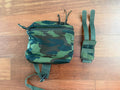 Russian Tekhinkom Dump Pouch – VSR-98 Pattern displayed on a wooden surface, showing camouflage fabric with zippers and adjustable straps for tactical use.