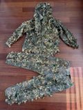 Russian Intendant Service Leaf Suit - 2023 Contract FSB - Autumn Camo - Size 54-56/5 laid out on wooden floor, featuring detailed leaf texture for effective camouflage in forest environments.