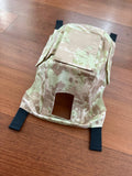 Russian LSHZ Helmet Cover – Arid/Desert Pattern (Syria) Size 2 displayed on wooden floor, featuring light tan and brown camouflage with black adjustable straps.