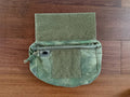 Russian Ars Arma Dangler Pouch – A-TACS FG (Pre-War Production) in camouflage fabric, partially open to show interior and velcro flap, displayed on wooden surface.
