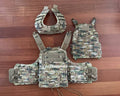 Russian Gear Craft - "Atom 1.0" Plate Carrier - Multicam - Size M displayed with modular components in a multicam pattern on wooden surface, emphasizing tactical gear design.