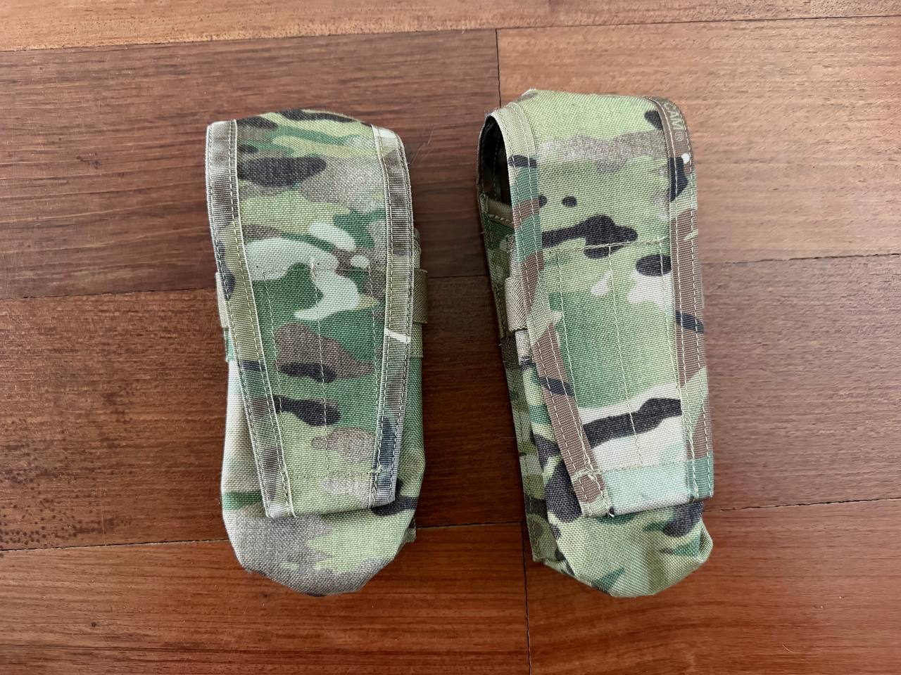 Russian Ars Arma Set of 2 Mag Pouches – Multicam (Used) displayed on a wooden surface, featuring durable camouflage fabric suitable for tactical or outdoor use.