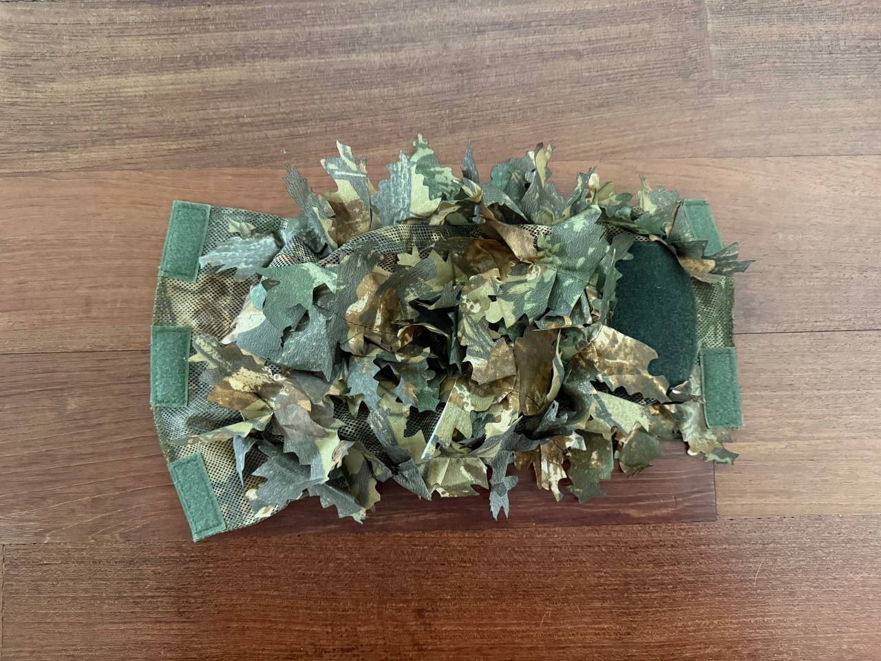 Russian FSB "Autumn" Contract Leaf Helmet Cover with realistic fabric leaves in autumn colors, designed for effective camouflage and concealment.