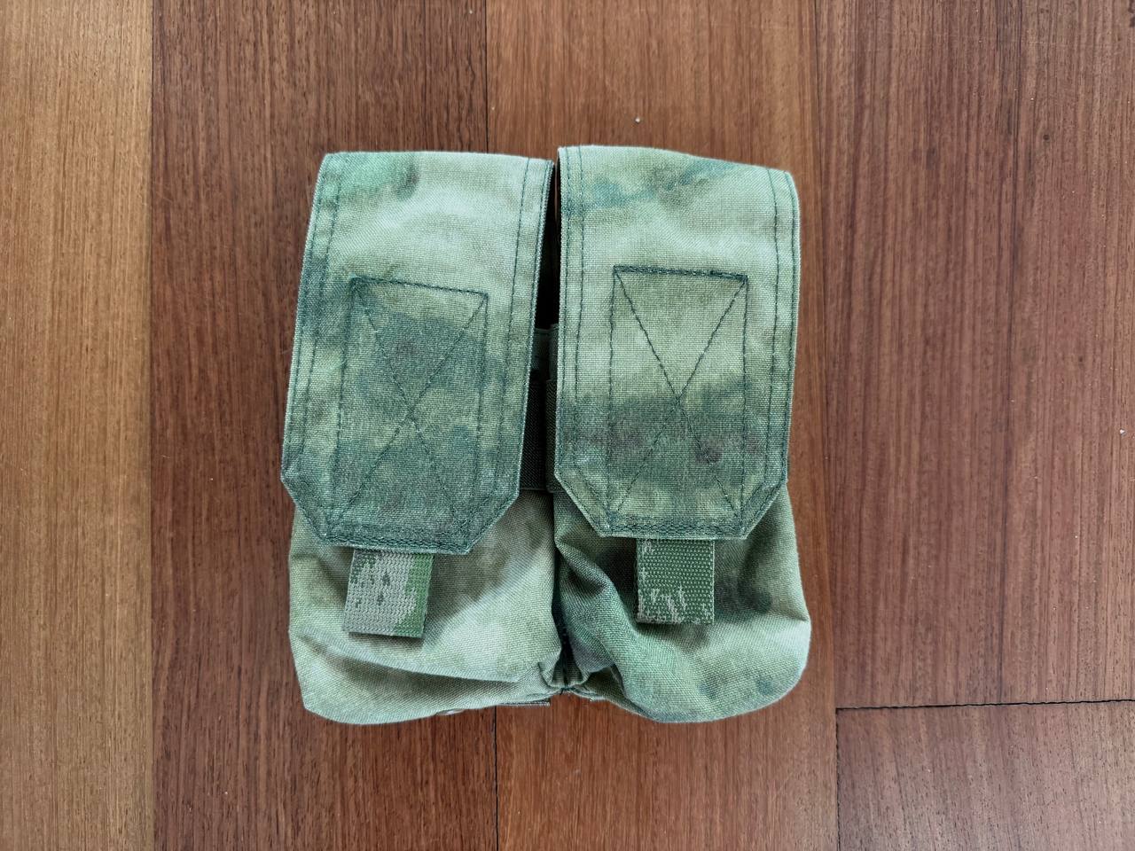 Warrior Assault Systems 4-Cell Mag Pouch - A-TACS FG Camo - Russian Style in green camo pattern with double flap closures designed for tactical magazine carrying.