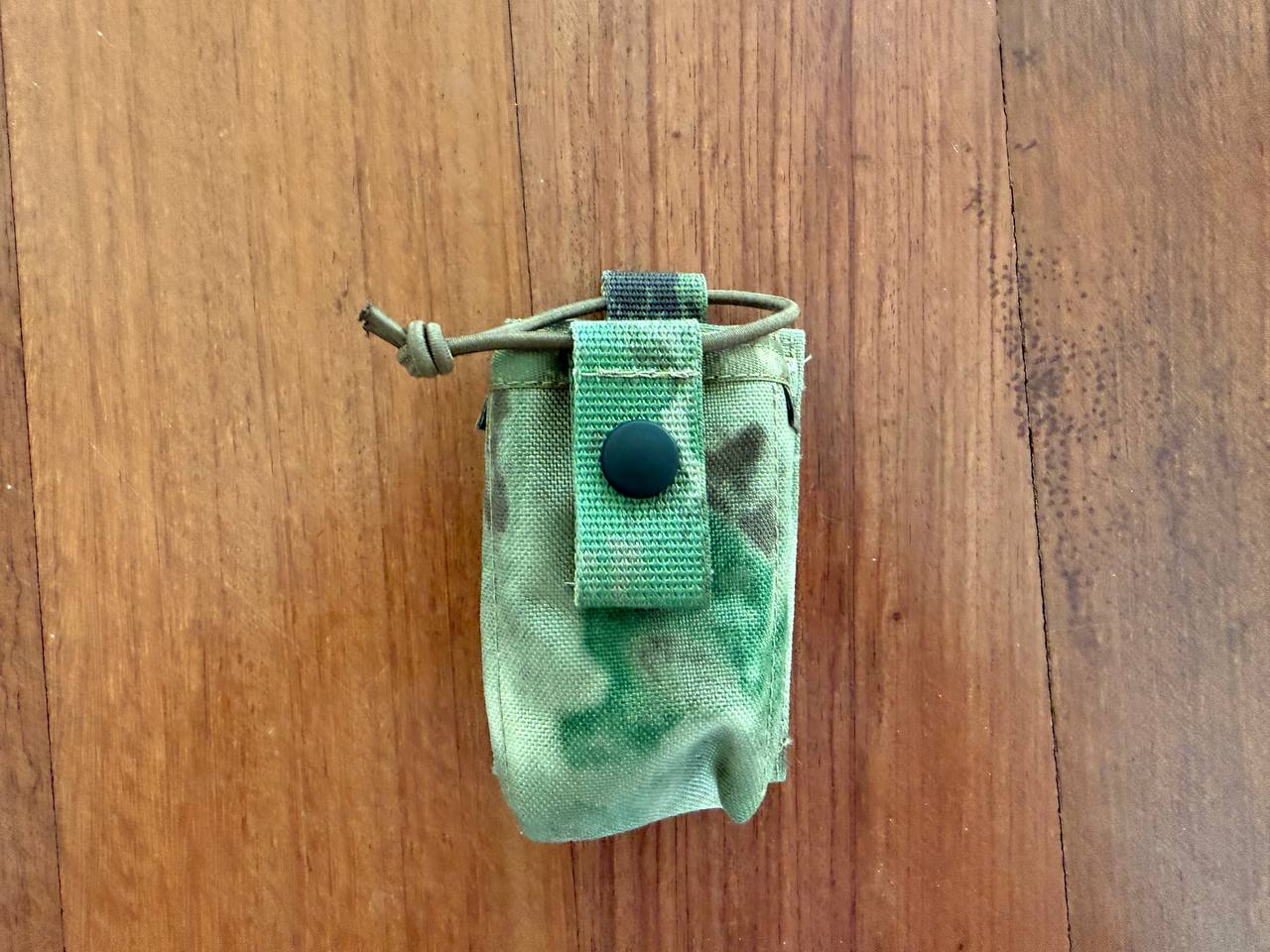 Compact tactical pouch in A-TACS FG camo with secure snap closure, designed for durable radio storage and easy access, Russian SRVV Tactical Radio Pouch - A-TACS FG Camo.