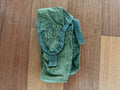 Compact green digital camouflage tactical pouch with secured flap and strap, shown on wooden surface, Russian Tekhinkom Left-Handed 2x AK Mag Pouch + ROP Flare - EMR - Old Gen.