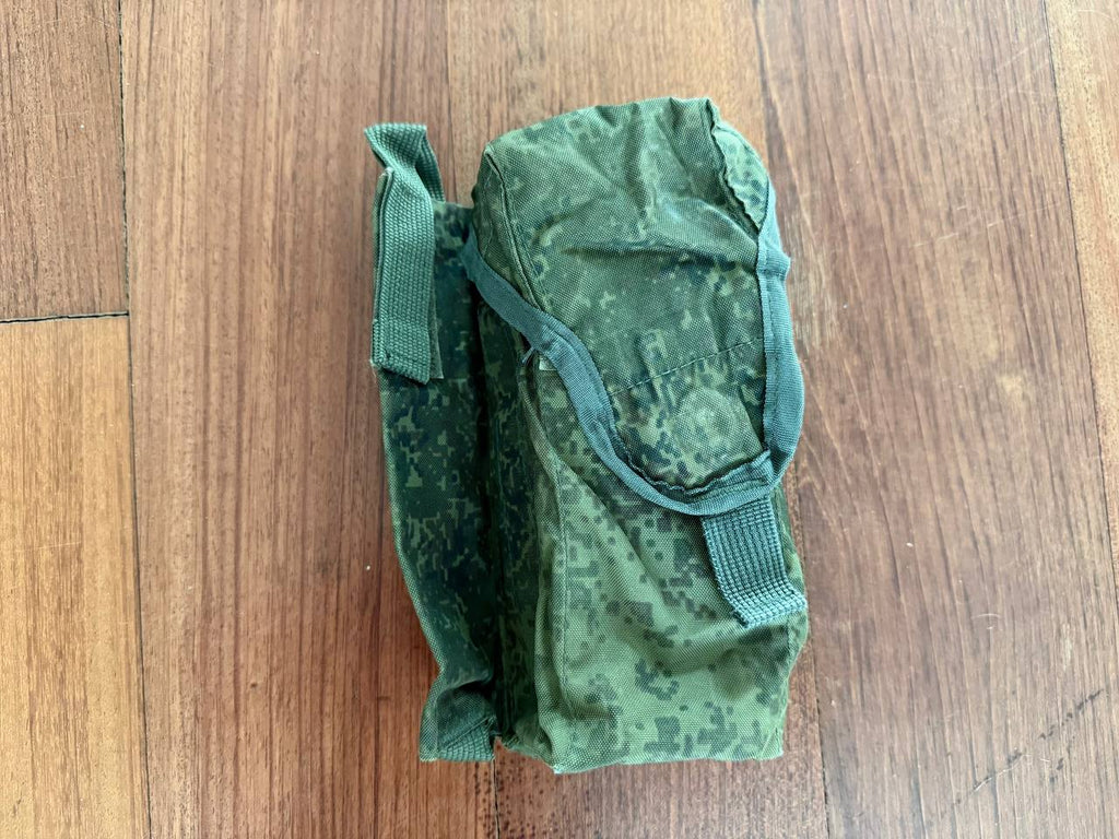 Compact green camouflage pouch made of durable fabric, designed for carrying 2 AK magazines and a flare, identified as Russian Tekhinkom Right-Handed 2x AK Mag Pouch + ROP Flare - EMR - Old Gen.