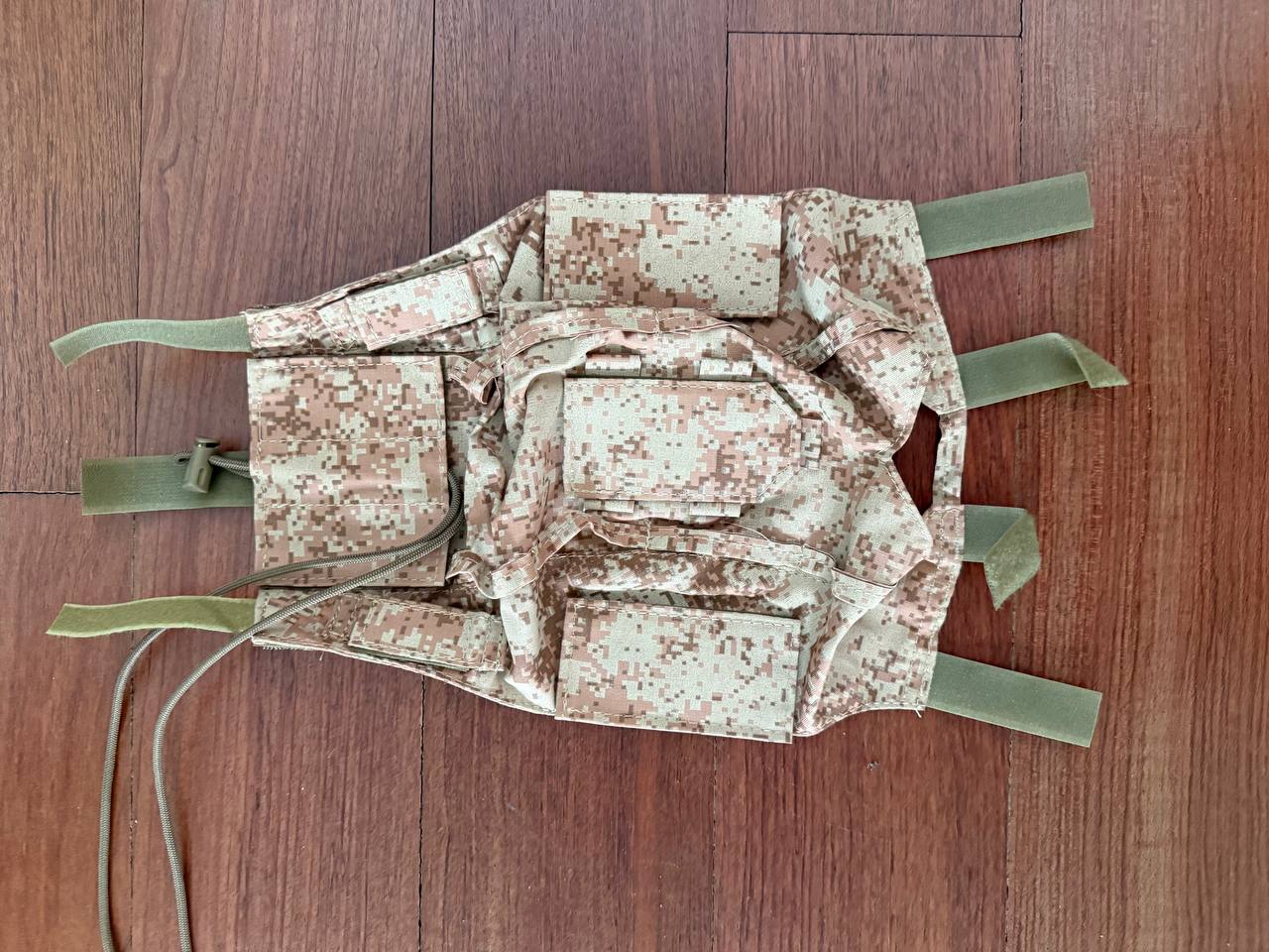 Russian Desert EMR Helmet Cover for Ops-Core Helmets - Size M/L in digital desert camouflage pattern, laid flat on a wooden surface showing straps and detailed stitching.