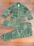 Russian Alliance Group Layer 4 Summer Suit (Commercial Prod.) - EMR - Size 52/4 laid flat on wooden floor, featuring digital camo pattern typical of Russian surplus tactical gear.