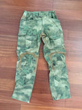 (WUSED) Russian Ars Arma Gen 3 Extreme Combat Pants - ATACS FG - Size 32L displayed on wooden floor, featuring green camouflage pattern and durable fabric with multiple pockets, Russian surplus style.