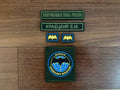 Set of military patches including Russian text, featuring a large circular patch with bat emblem and two smaller bat insignias, and two rectangular name and unit patches, part of the Russian GRU Spetsnaz (Random Russian Names) - Military Patch Set.