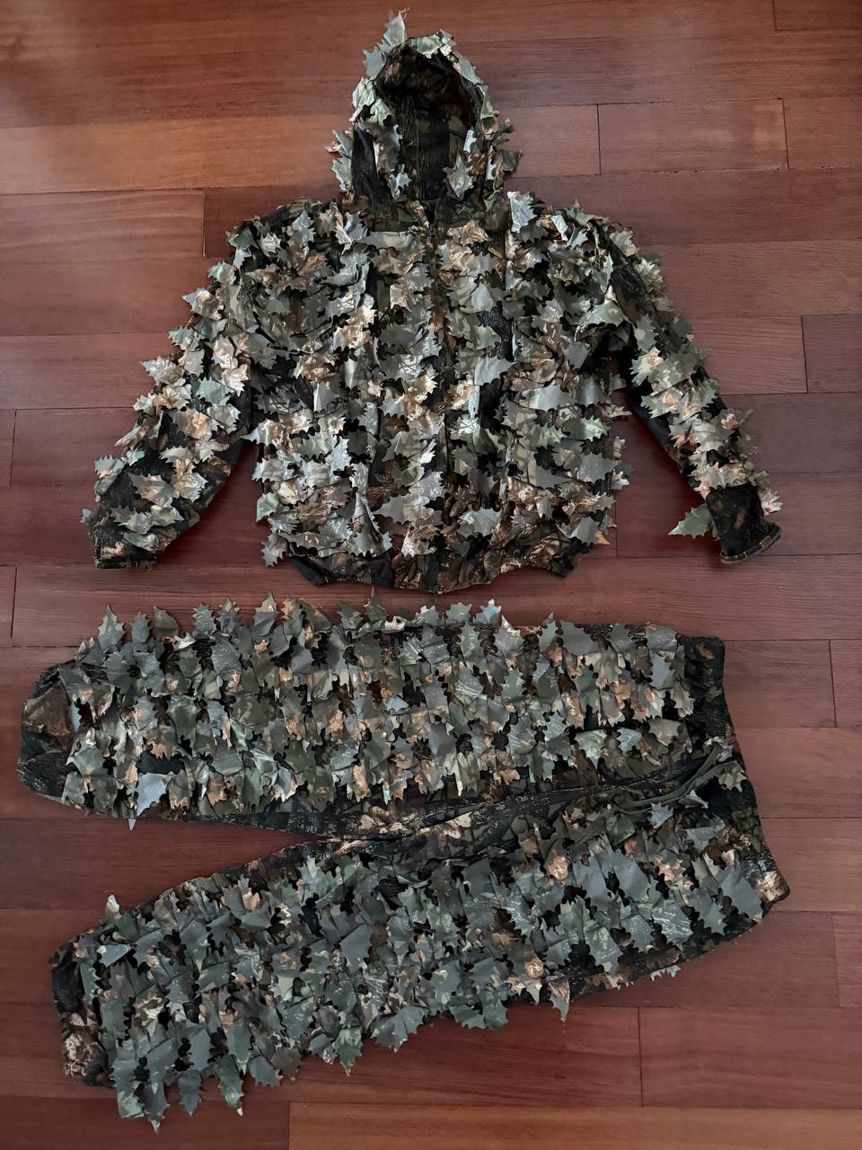 Russian Praktika Special Leaf Suit - Autumn Camo - FSB Contract - Size 48/5 displayed flat, featuring detailed 3D leaf pattern camouflage in autumn colors, representing authentic Russian surplus gear.