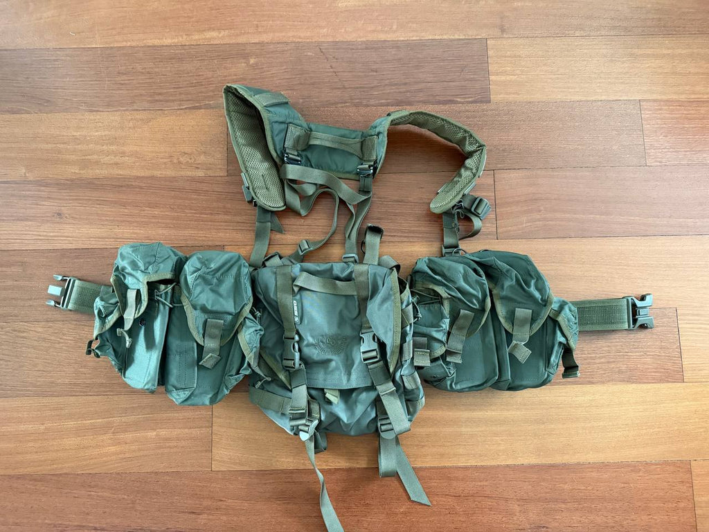Russian SSO (SPOSN) Smersh Load Bearing Rig - Olive Drab, a military-style load bearing vest with multiple pouches and adjustable straps designed for Russian surplus tactical use.