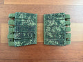 Russian Triada-TKO VOG Grenade Pouches - EMR Camo displayed on wooden surface, featuring digital camouflage pattern and multiple securing straps.