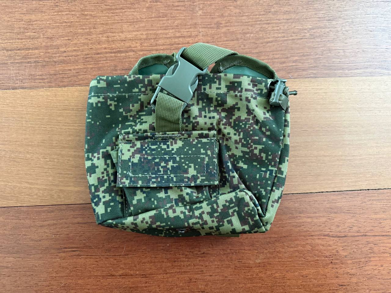 Compact Russian Triada-TKO Water Canteen Pouch - EMR Camo with a secure buckle and pocket, designed for durable and practical outdoor or tactical use.
