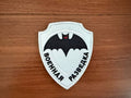 Russian "Military Intelligence" Spetsnaz GRU - Military Patch featuring a black bat with red eyes on a white shield background with Cyrillic text on a wooden surface.