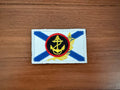 Embroidered Russian Naval Infantry - Military Patch featuring a blue Saint Andrew's cross on white background with a yellow anchor and laurel emblem in the center, displayed on a wooden surface.