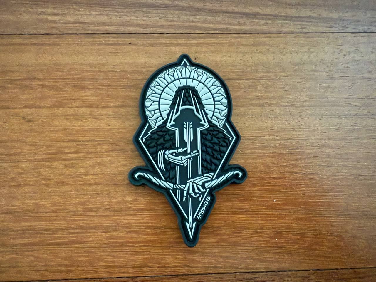 Decorative patch with a design on a wooden surface