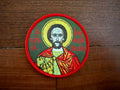 Russian "Saint Alexander Nevsky" Icon Orthodox - Military Patch with a detailed embroidered depiction of Saint Alexander Nevsky on a green background with red border and Cyrillic text.