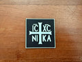 Russian Orthodox "IC XC NIKA" PVC Black/White - Military Patch showing a white cross and lettering on a black square background, suitable for military or tactical gear.