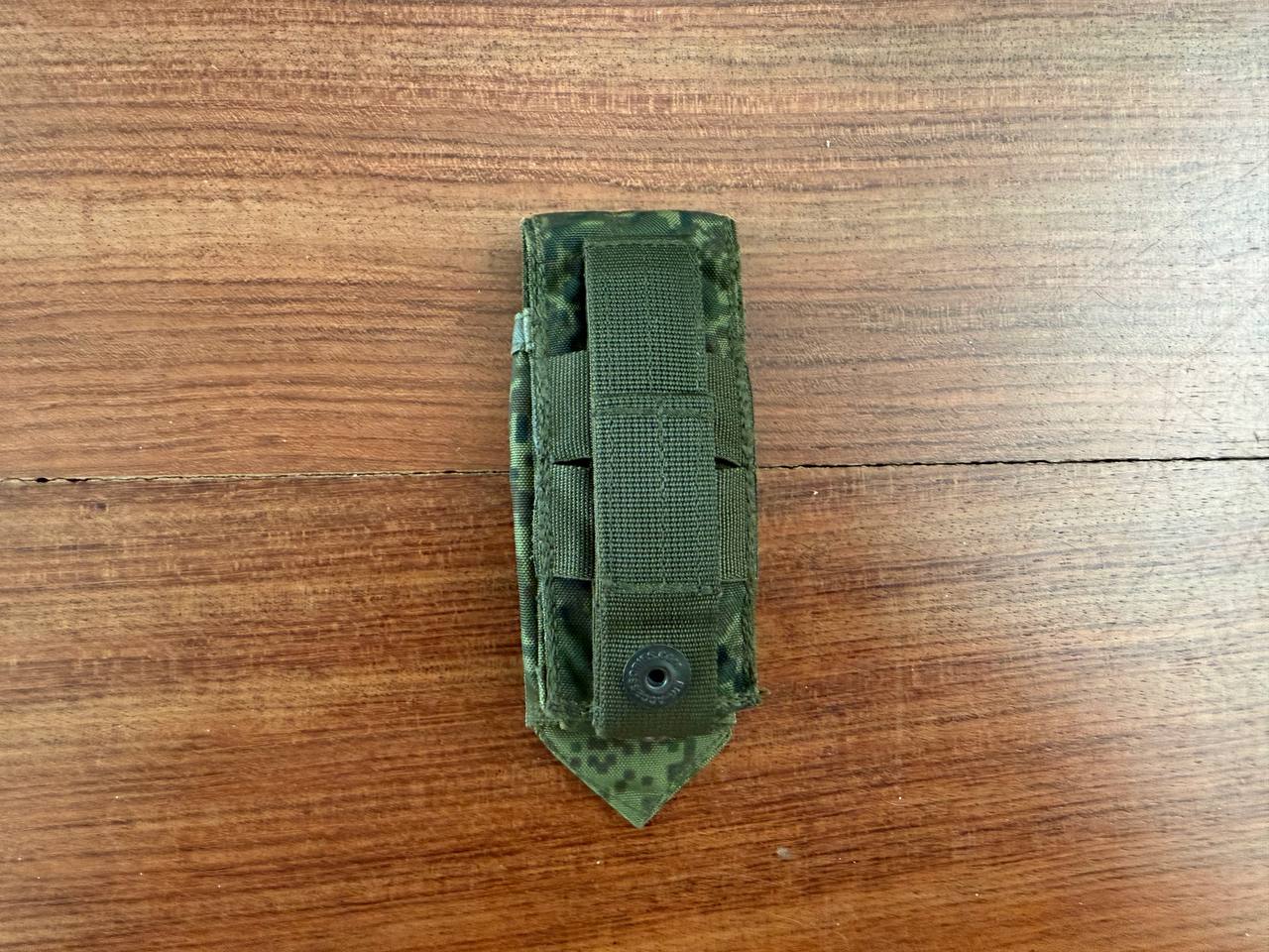 Russian Wartech - Single Pistol Mag Pouch – EMR (Digital Flora) in digital camouflage pattern, designed for secure pistol magazine storage with a durable strap and snap closure on a wooden surface.