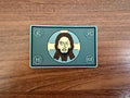 Russian Orthodox "IC XC NIKA" Grey PVC - Military Patch featuring a stylized face of Christ in the center with traditional Cyrillic lettering on a grey background.