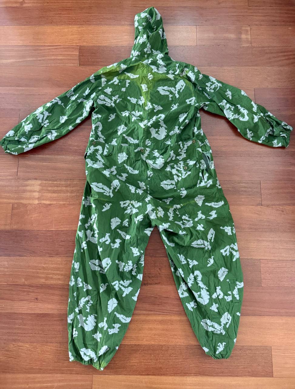 Russian "KLMK" Summer Oversuit - Size 3 displayed flat on wooden floor, featuring green and white camouflage pattern typical of Russian surplus military gear.