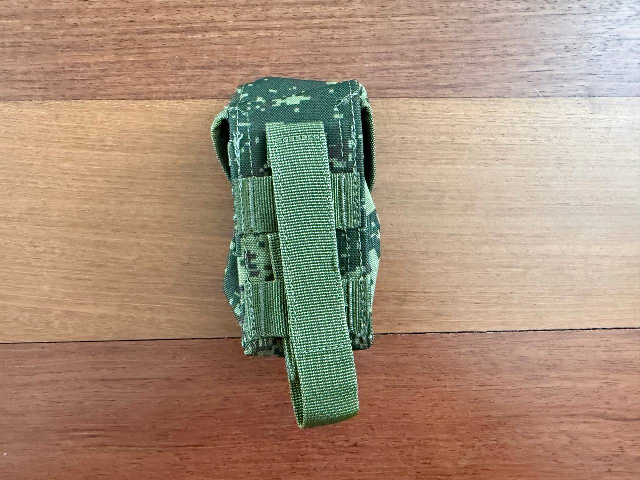 Russian Triada-TKO Single Grenade Pouch - EMR Camo in digital camouflage pattern designed for carrying a single grenade, featuring durable fabric and secure fastening strap.