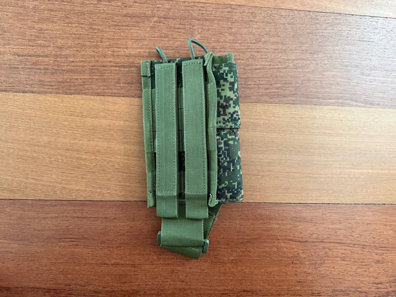 Russian Triada-TKO Tactical Radio Pouch - EMR Camo in a green and digital camouflage pattern, designed for secure attachment and durable use in tactical settings.