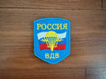 Russian Airborne Forces VDV - Military Patch featuring a parachute and wings design on a blue background with the Russian flag and Cyrillic text, representing Russian surplus.