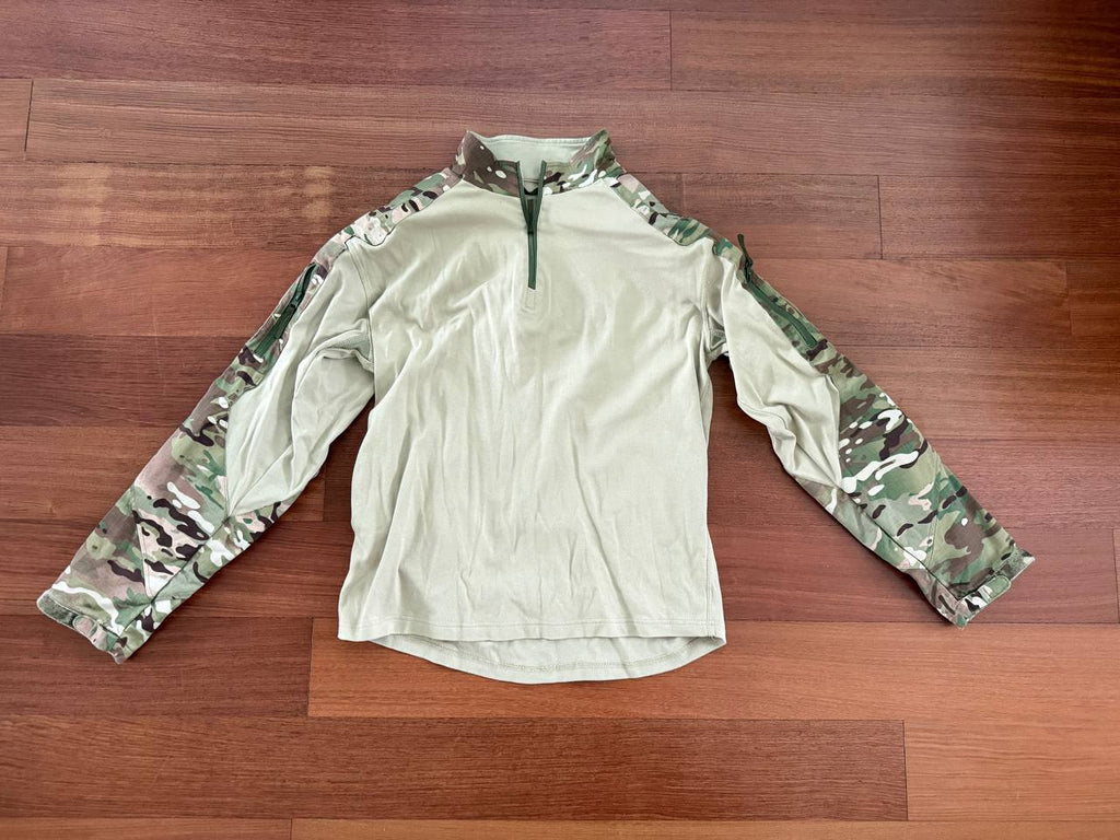 Russian Slavyanka FSB Contract Set – Multicam - Size 54/5 tactical shirt featuring multicam camouflage sleeves and a light tan body, laid flat on a wooden floor.