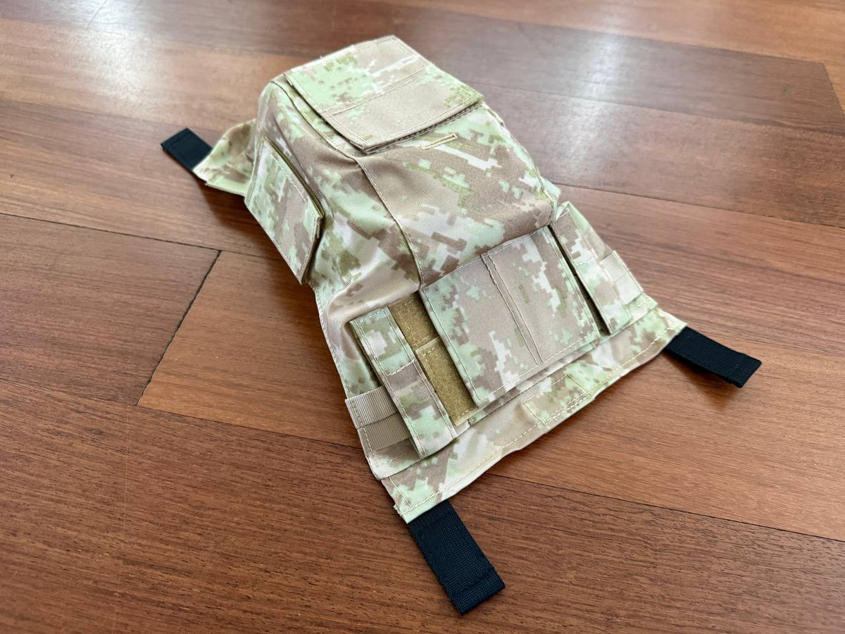 Russian LSHZ Helmet Cover – Arid/Desert Pattern (Syria) Size 2 displayed on wooden surface, featuring digital camouflage fabric and adjustable straps for secure fit.